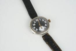 ANTIQUE WWI STERLING SILVER TRENCH WRISTWATCH, circular black dial with arabic numerals and hands,