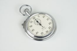 VINTAGE SMITHS TIMER, circular cream dial with hands, 55mm case with a crown and a case back, inside