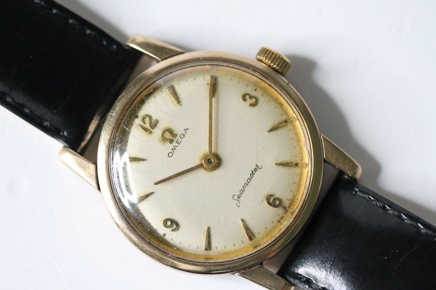 VINTAGE 9ct OMEGA SEAMASTER DRESS WATCH , circular cream dial, Arabic and arrow hour markers, 33mm