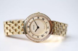 LADIES 18CT GUCCI DIAMOND BEZEL WRIST WATCH, circular champagne dial with roman numeral hour