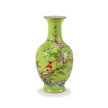 A CHINESE GREEN SGRAFFITO VASE