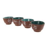 GROUP OF FOUR YIXING TEA CUPS