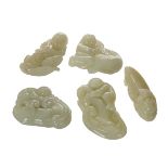 GROUP OF FIVE JADE TOGGLES