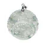 A RARE ROUND JADEITE PHOENIX PENDANT