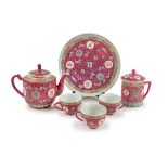CHINESE RED GROUND FAMILLE ROSE TEA SET