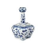 A CHINESE BLUE AND WHITE TULIP VASE