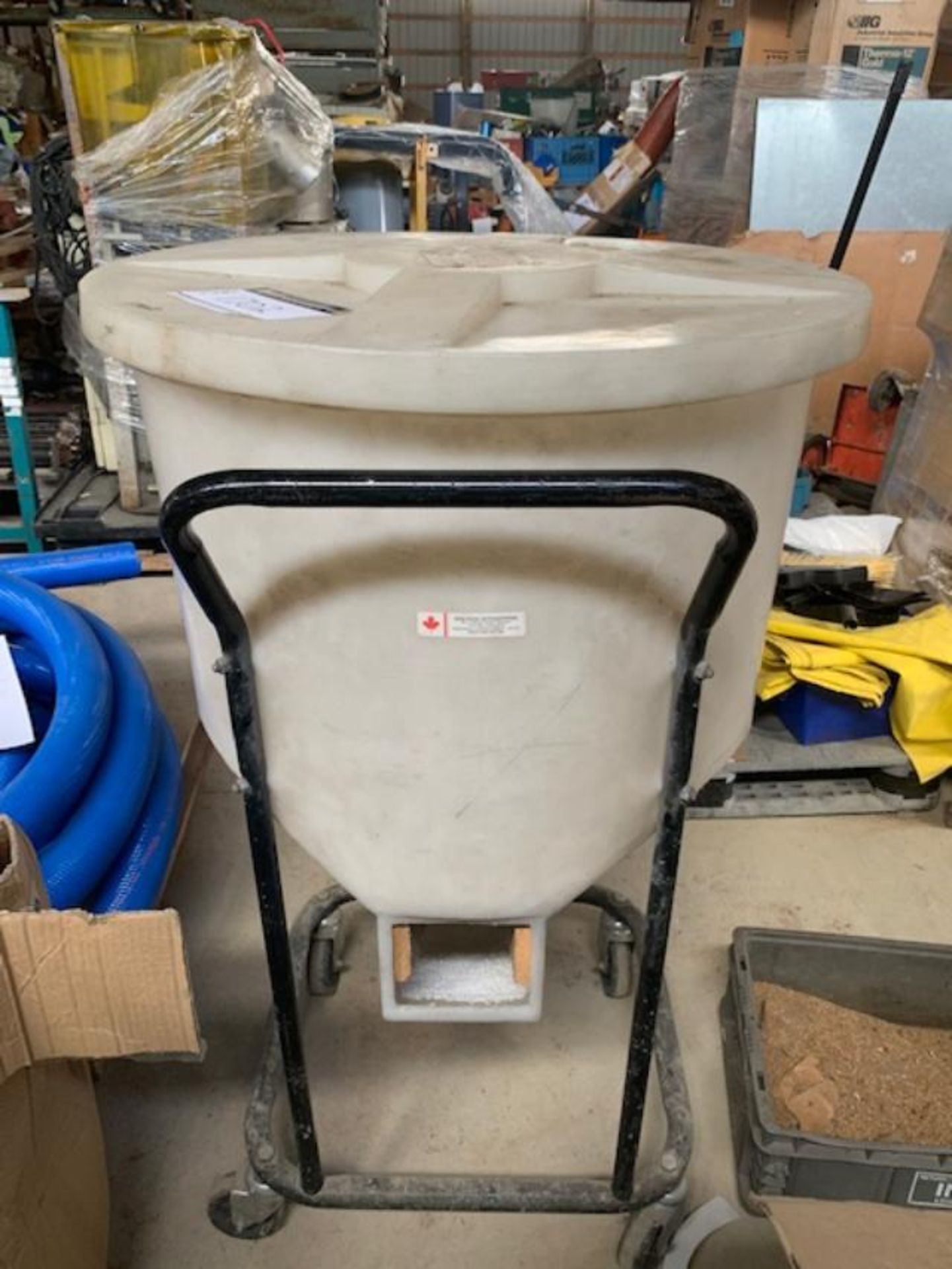 GRANULAR PLASTIC FEED HOPPER, 24” DIA 48” HIGH ON WHEELS, SUCTION HOLE ON BOTTOM, RIGGING FEE $ 20.