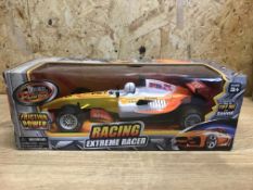 24 x NEW FRICTION RACER RACING CARS. PRICE MARKED AT £15 EACH