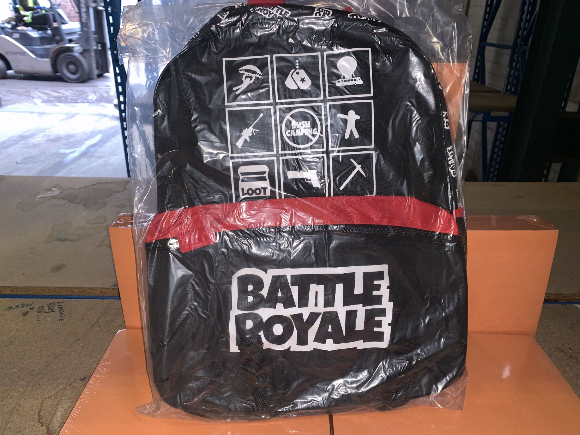 24 X BRAND NEW BOXED BATTLE ROYALE LARGE BACKPACKS WITH FRONT POCKETS