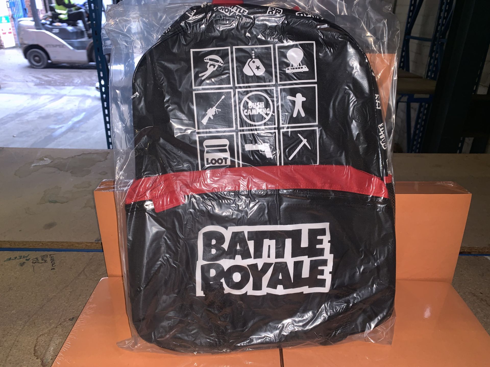 24 X BRAND NEW BOXED BATTLE ROYALE LARGE BACKPACKS WITH FRONT POCKETS