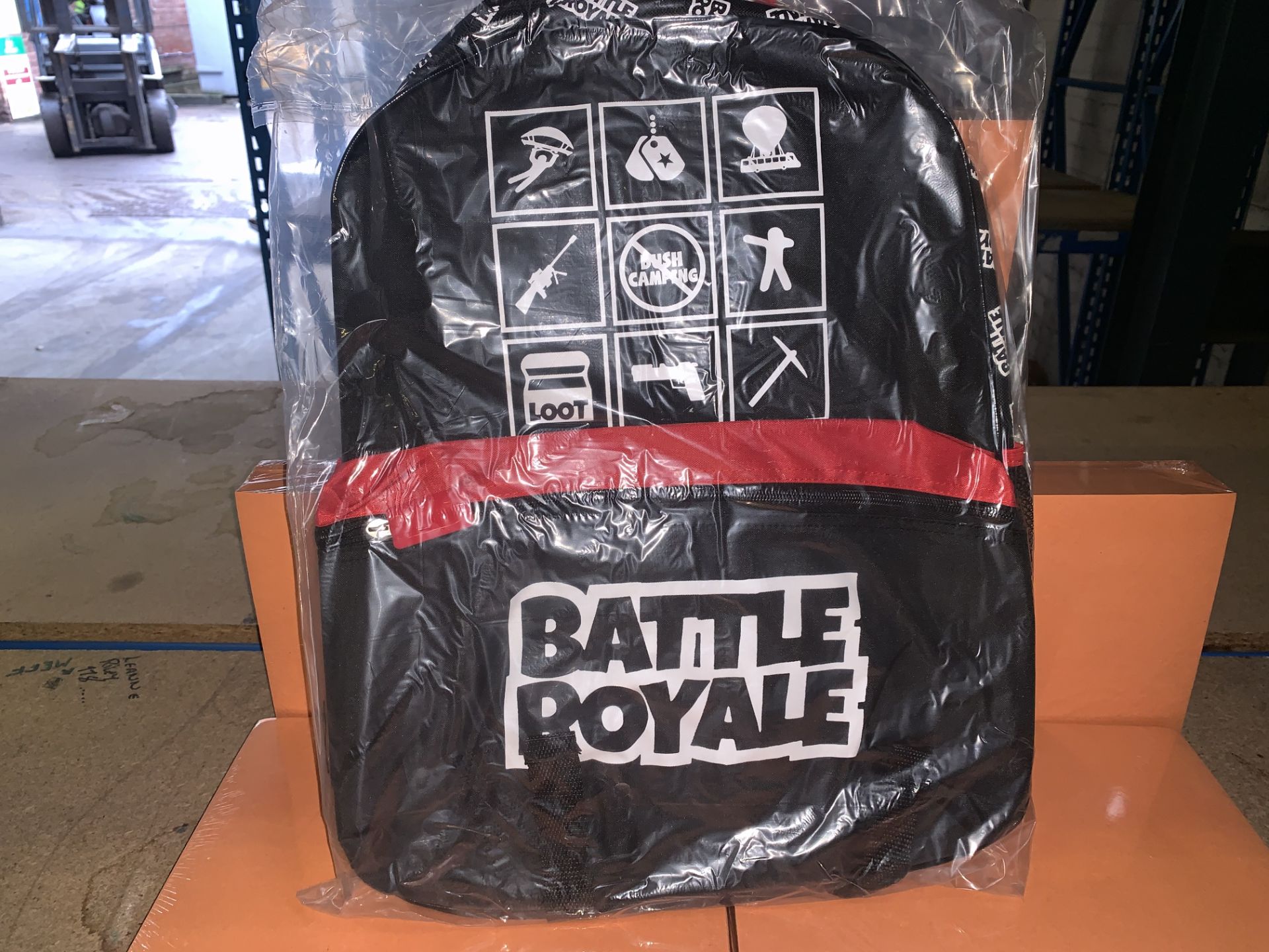 24 X BRAND NEW BOXED BATTLE ROYALE LARGE BACKPACKS WITH FRONT POCKETS