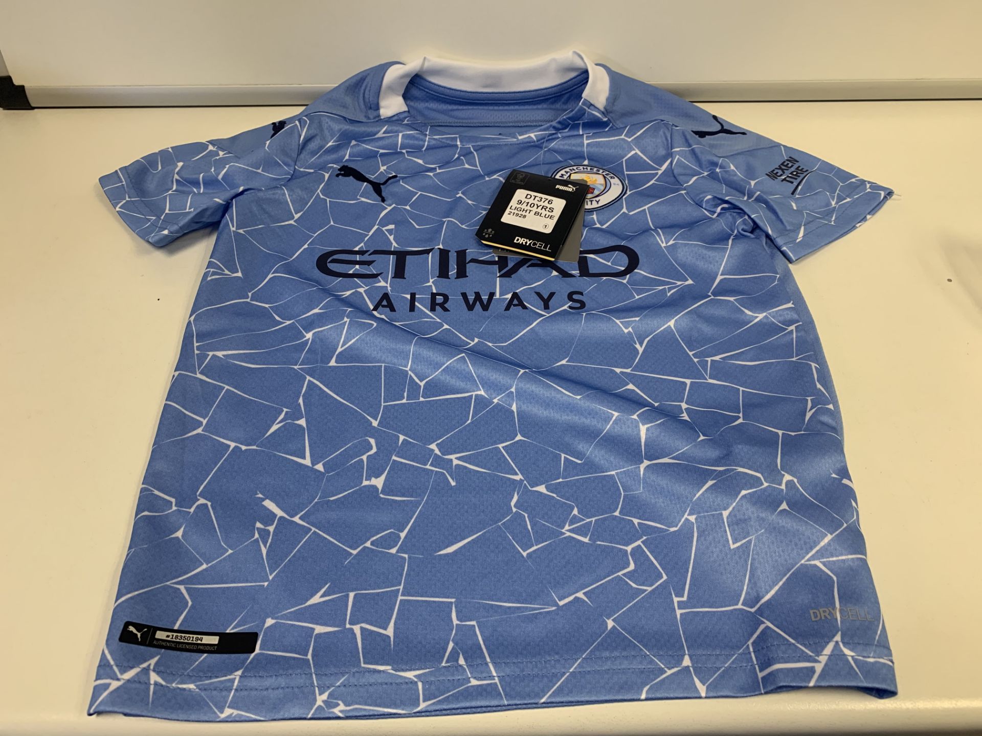 (NO VAT) 4 X BRAND NEW CHILDRENS PUMA MAN CITY SHIRTS (AGE 9-10) AND 2 NIKE T-SHIRTS AGE 3-6M