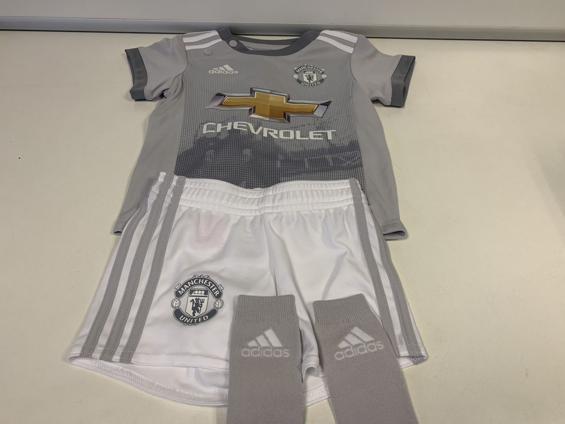 (NO VAT) 7 X BRAND NEW MANCHESTER UNITED GREY AWAY TOPS AGE 3-6M