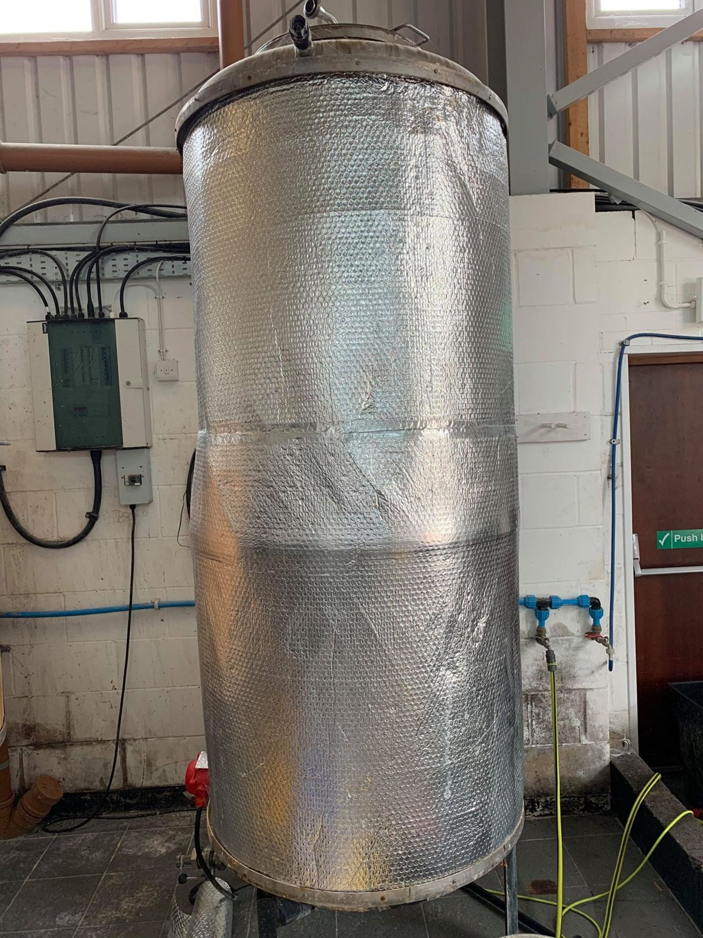 Stainless steel 1,300-litre vertical cylindrical insulated hot liquor tank with 18Kw threephase