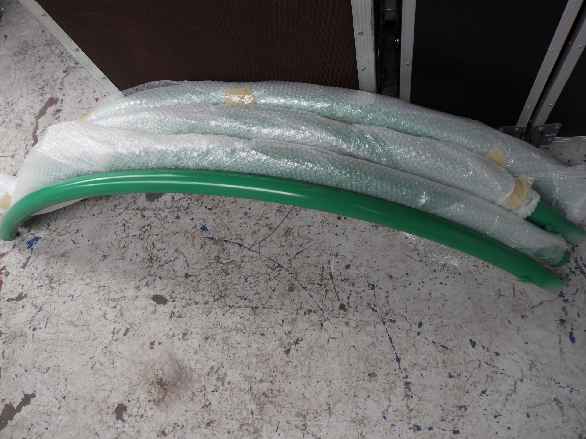 1m radius circle tube spray painted green in 4 sections with spiggets