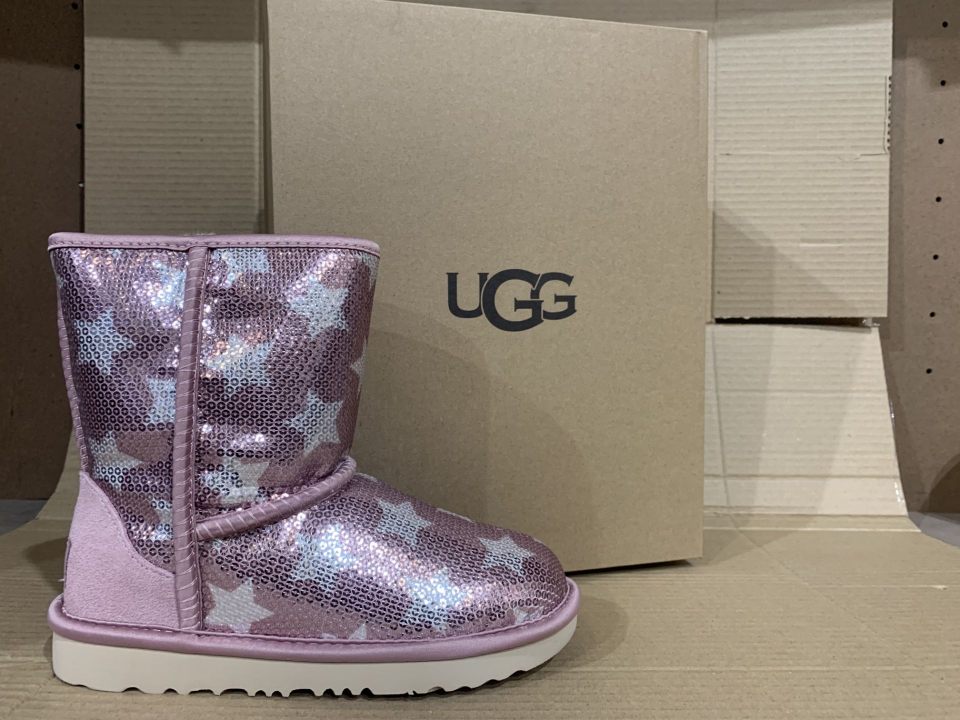 (NO VAT) NEW BOXED PAIR OF UGG PINK BOOTS. SIZE UK 1