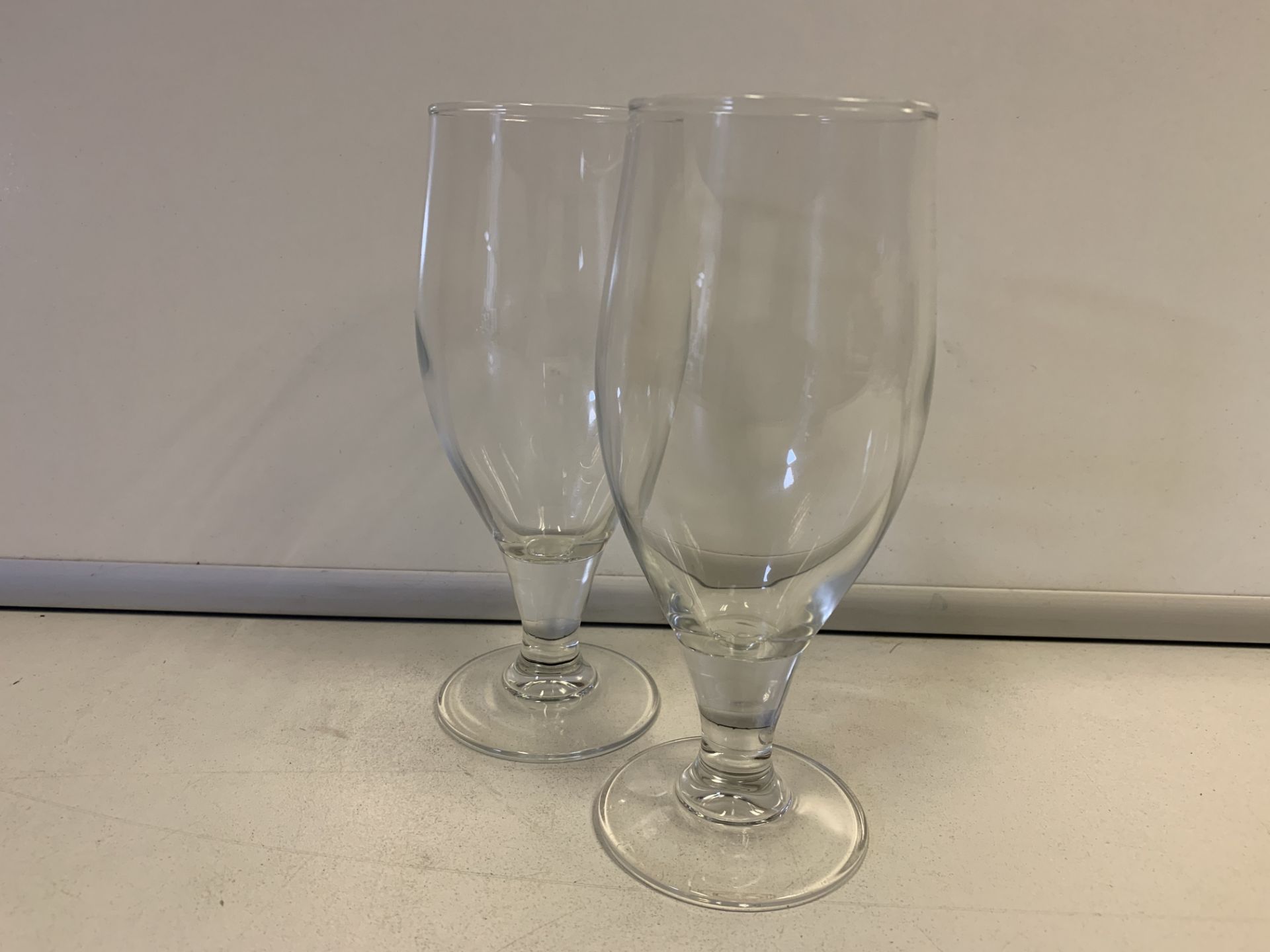 7 X BRAND NEW PACKS OF 24 HALF PINT STEMMED BEER GLASSES