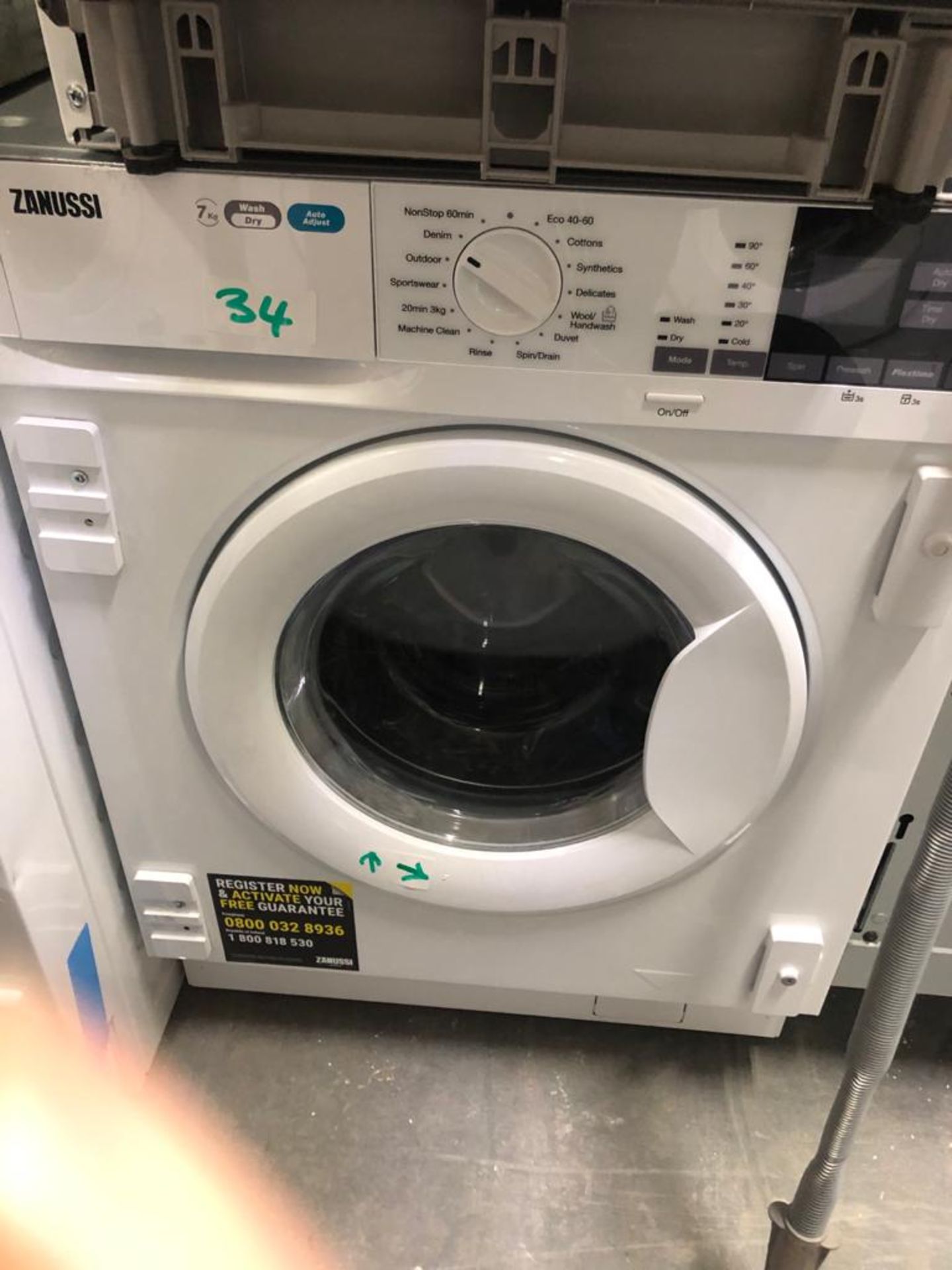 NEW/GRADED AND UNPACKAGED Zanussi Z716WT83BI Integrated washer dryer (Scuffs on the front door