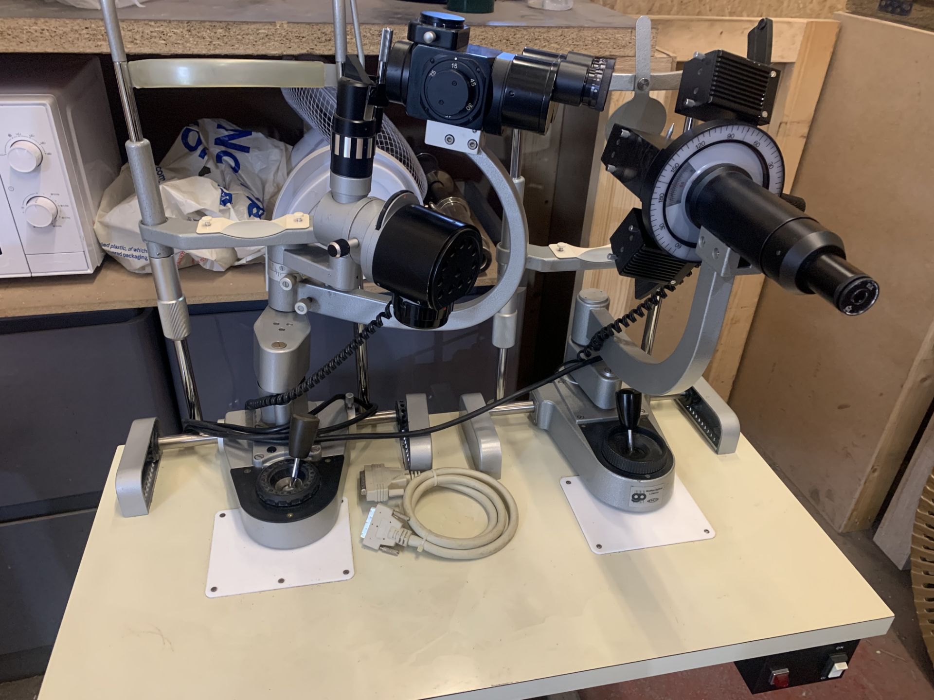 OPTICIANS INAMI SLIT LAMP AND GRAFTON OPHTHALMOMETER ON MOBILE STAND