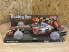 2 X NEW PACKAGED LARGE LIGHT & SOUNDS RACING CAR. PRICE MARKED AT £19.99 EACH