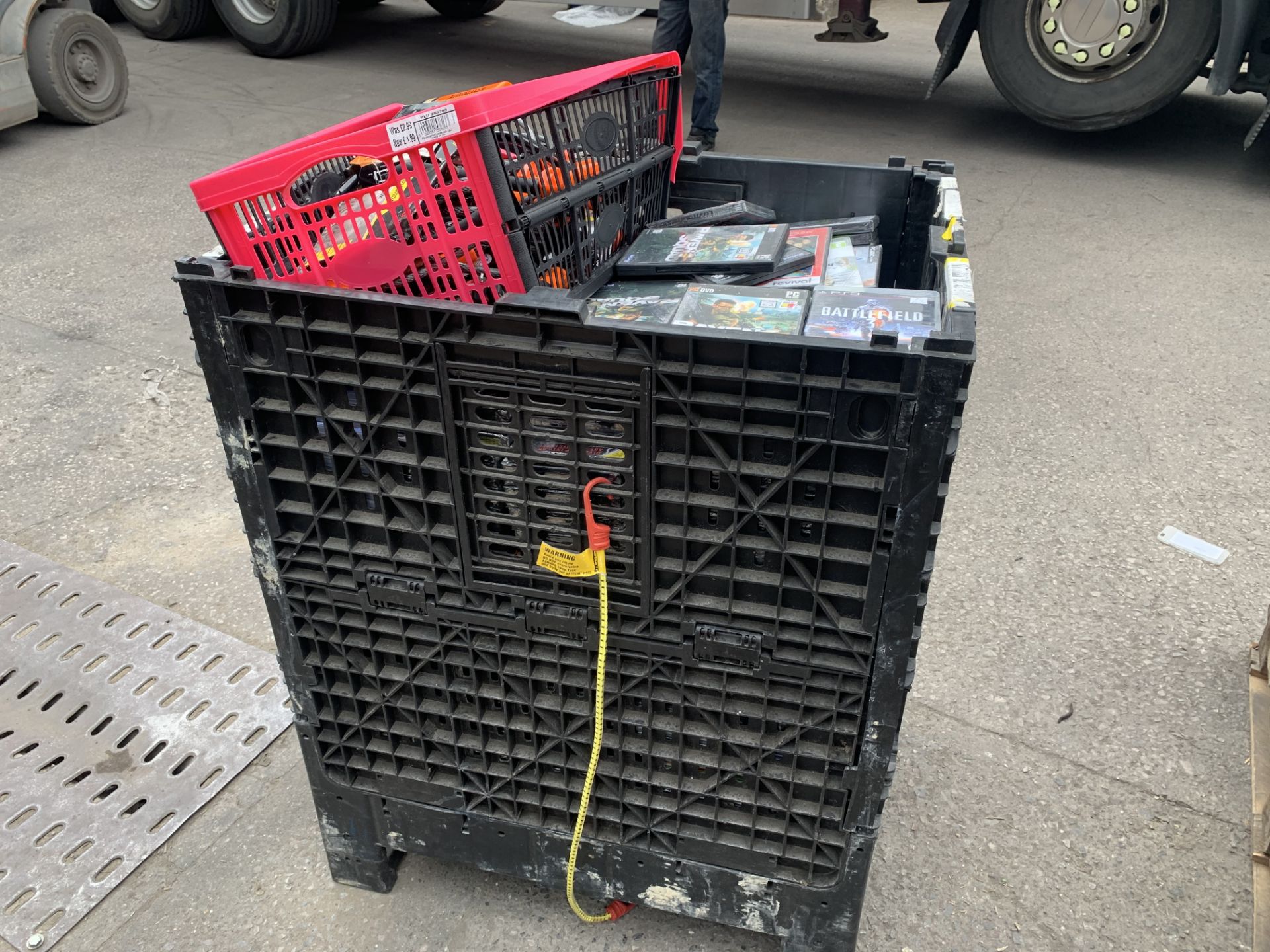 CONTENTS OF LARGE CONTAINER FULL WITH DVD'S AND COMPUTER GAMES AND U LOCKS FOR BIKES