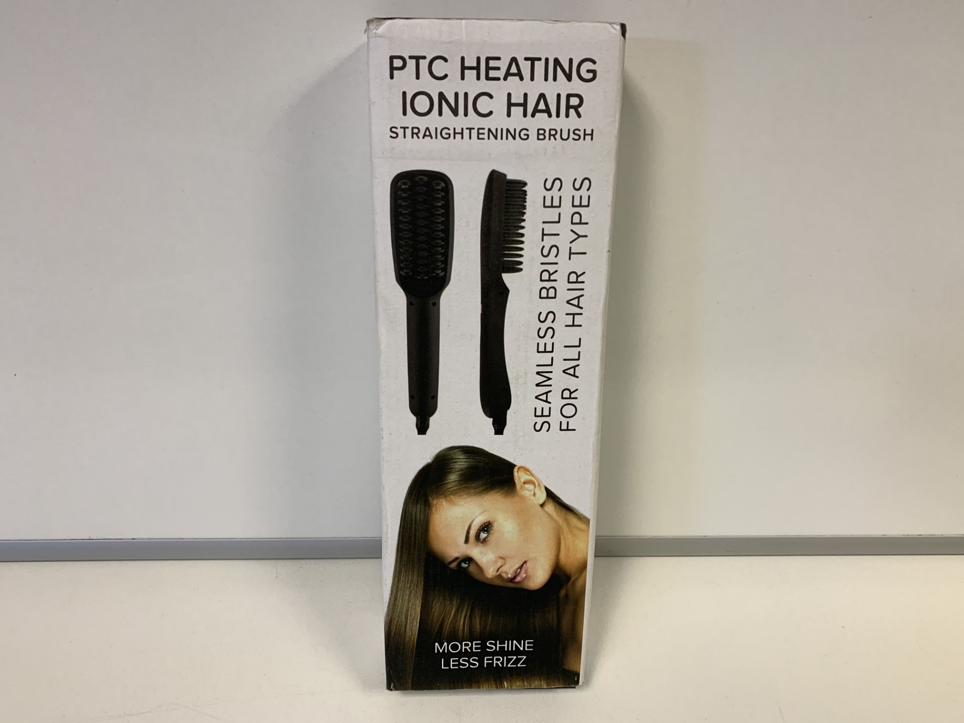 PALLET TO CONTAIN 80 X BRAND NEW PTC HEATING IONIC STRAIGHTENING BRUSHES. RRP £24.99 EACH