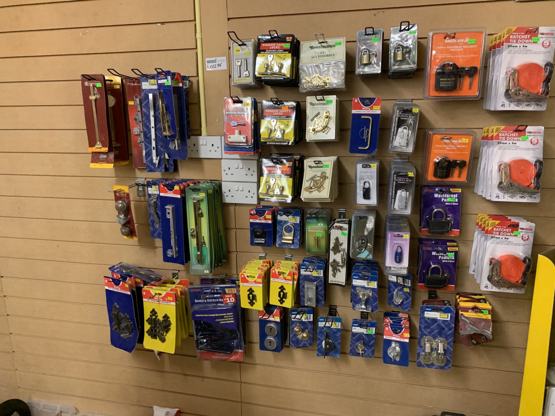 DISPLAY WALL OF LARGE QUANTITY OF DIY PRODUCTS INCLUDING MAXIMUM SECURITY PADLOCKS, WATERPROOF