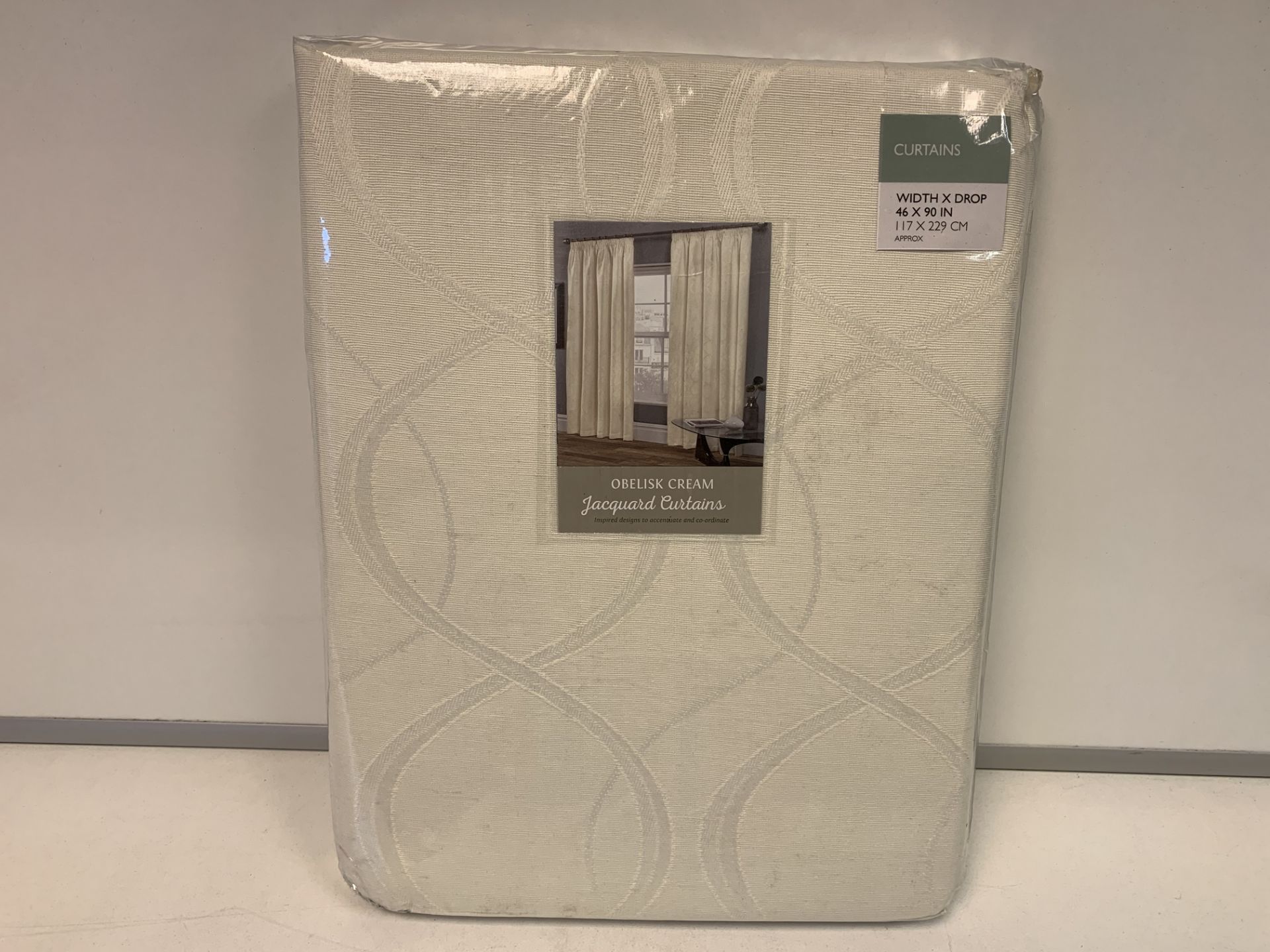 10 X NEW SEALED SETS OF OBELISK CREAM JACQUARD CURTAINS. SIZE 46x90 INCH. RRP £60 PER SET