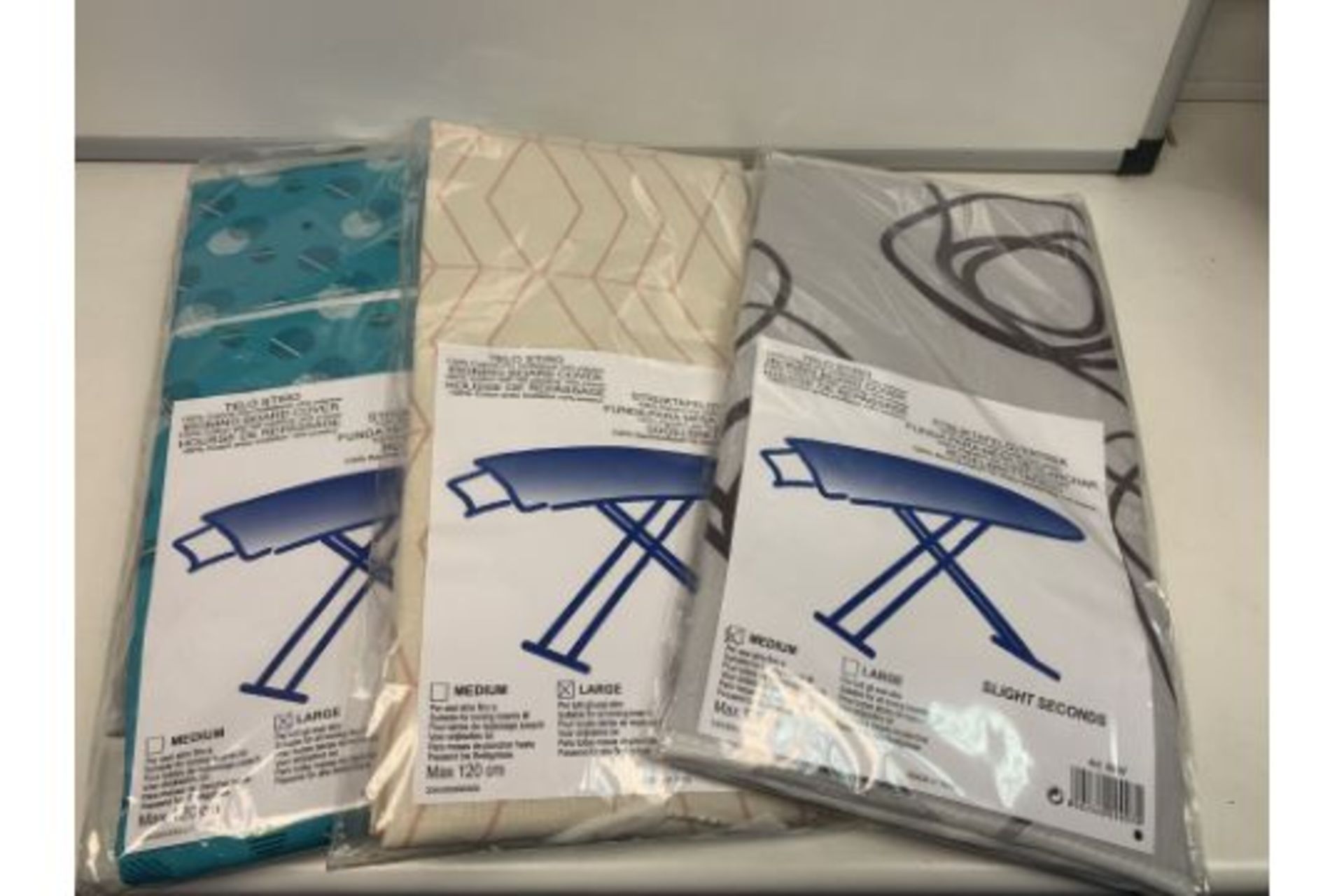 30 X NEW SEALED LUXURY IRONING BOARD COVERS IN VARIOUS STYLES/DESIGNS