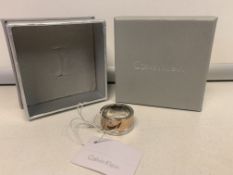 CALVIN KLEIN SILVER AND ROSE COLOURED FASHION RING WITH DISPLAY BOX