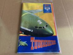 288 X BRAND NEW THUNDERBIRDS PLASTIC TABLECLOTHS 180 X 120CM IN 3 BOXES (785/1)