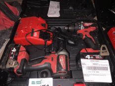 Milwaukee Set Drill and IMPACT DRIVER 18V INCLUDES 2 X BATTERIES, CHARGER & CARRY CASE. UNCHECKED