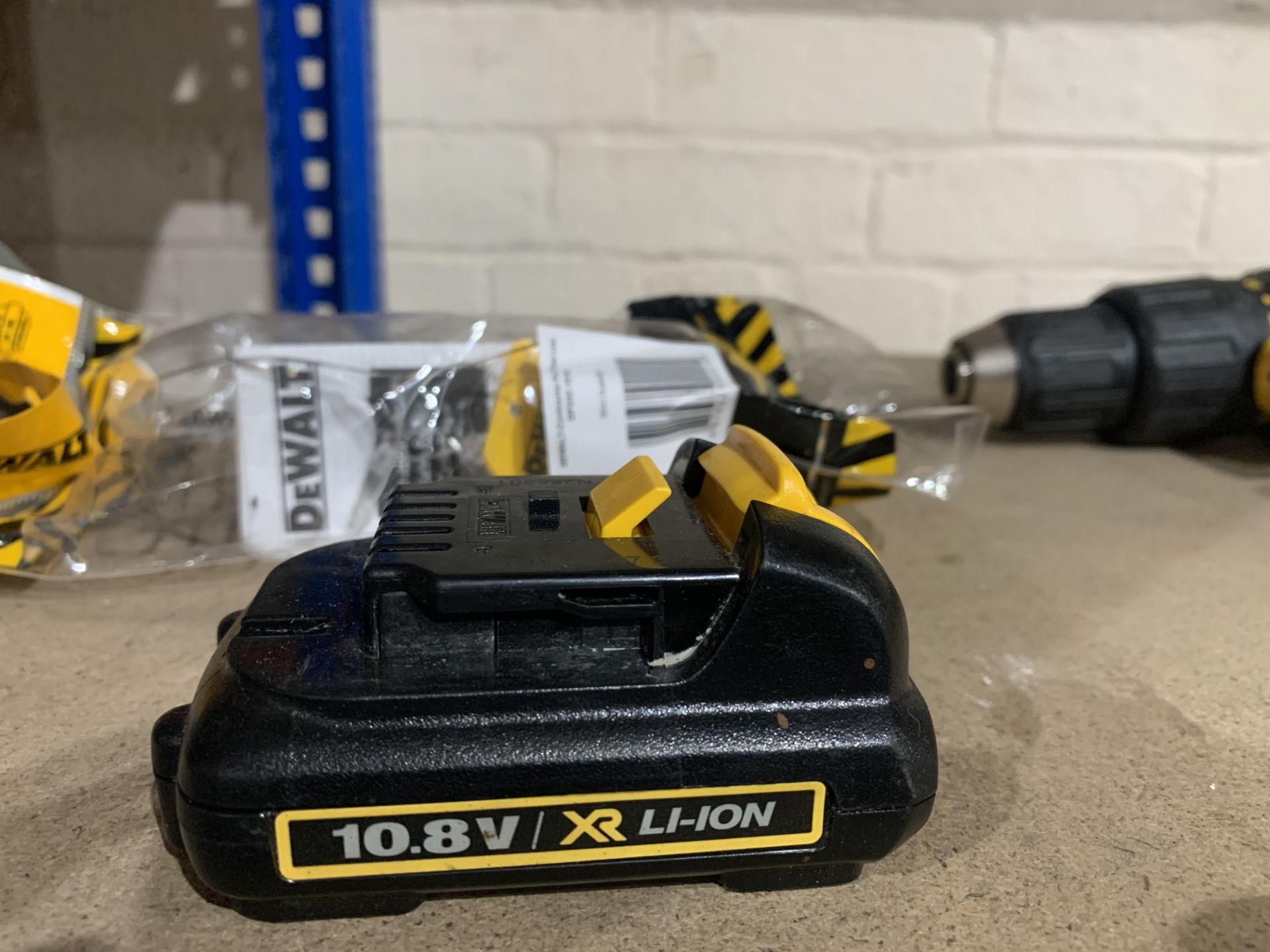 DEWALT 10.8V LI-ION BATTERY. UNCHECKED ITEM