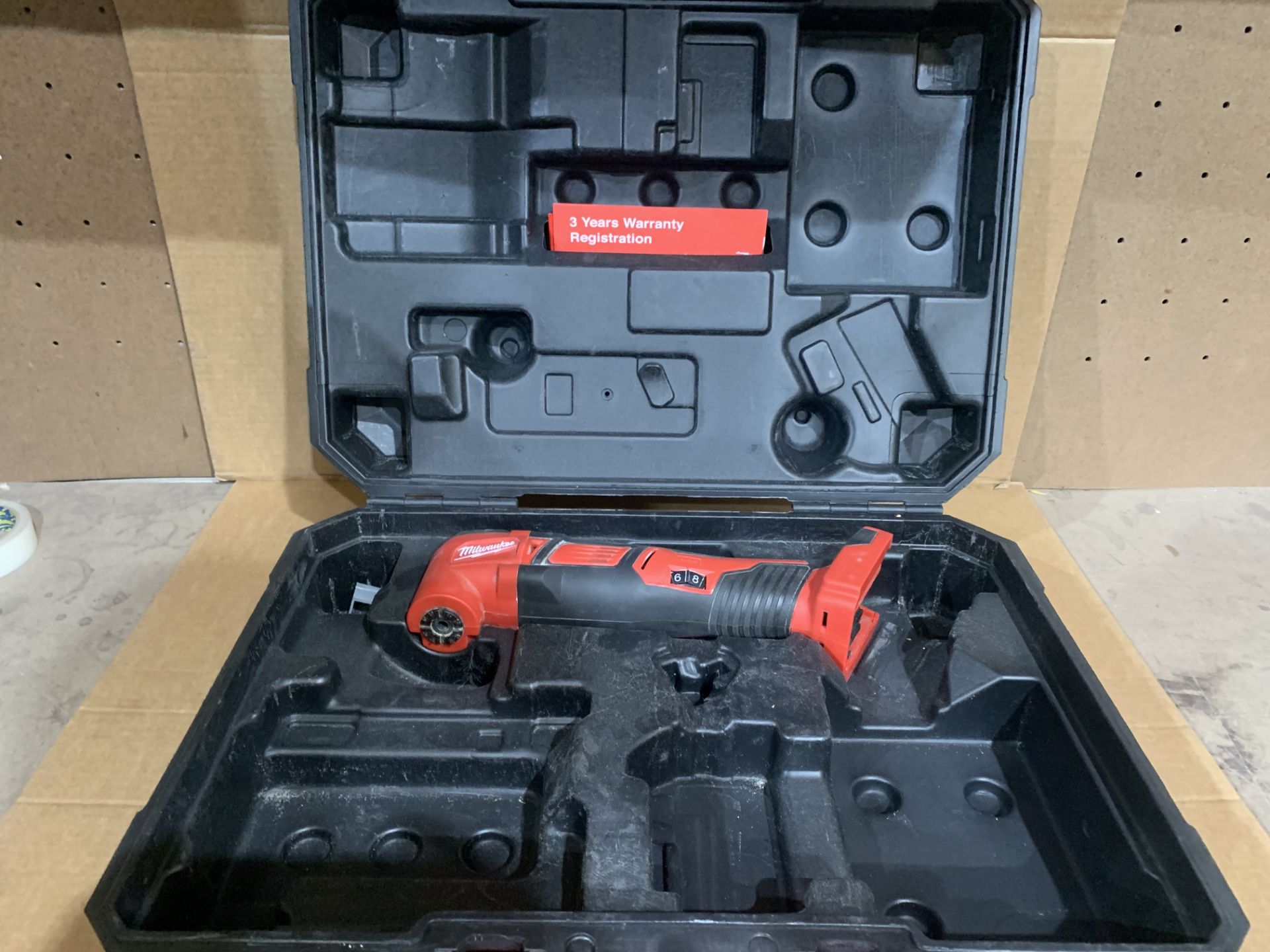 MILWAUKEE M18 MULTI TOOL WITH CARRY CASE. UNCHECKED