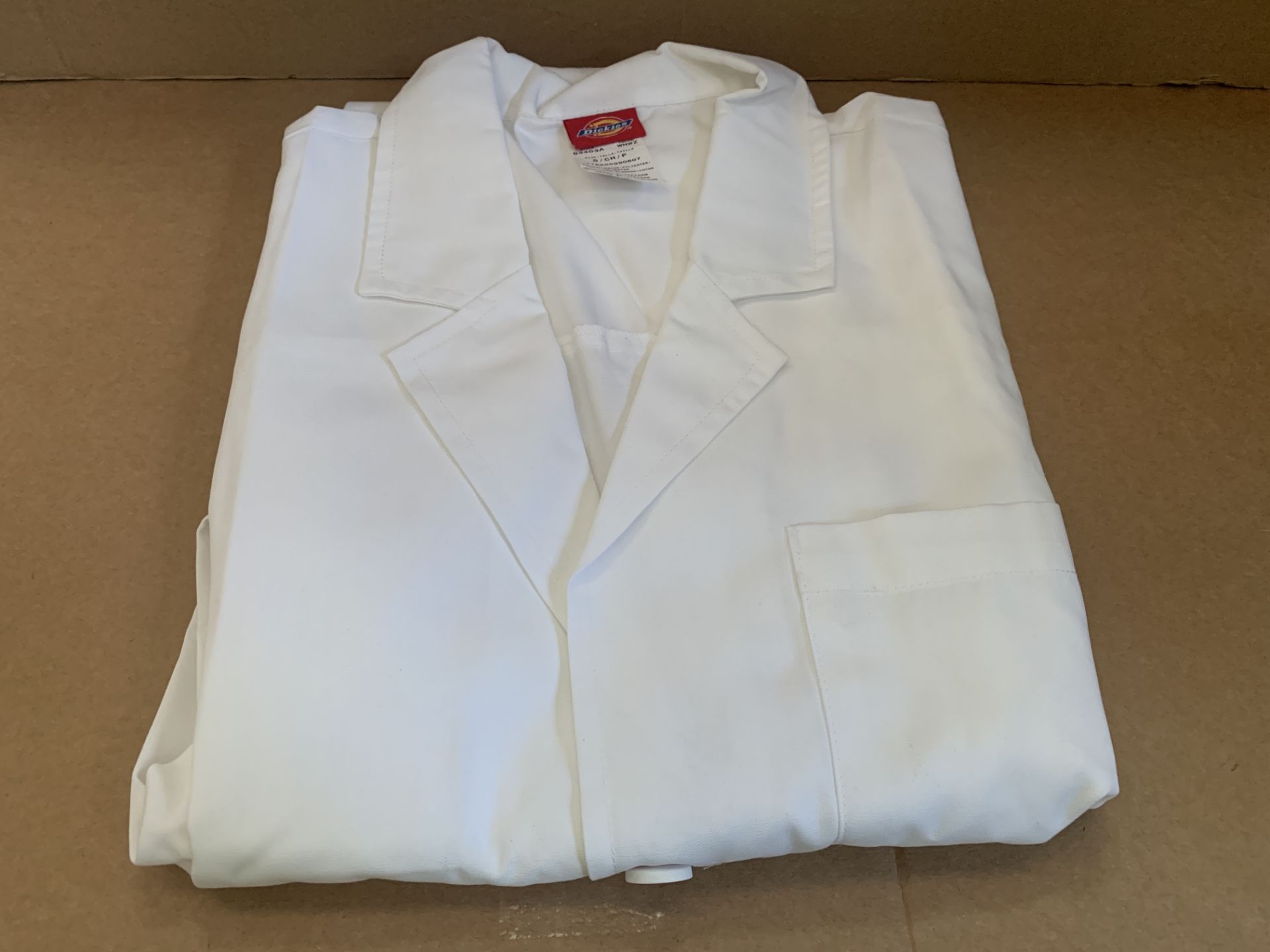 10 X BRAND NEW DICKIES MEDICAL WHITE UNIFORM TOPS (SIZES MAY VARY )