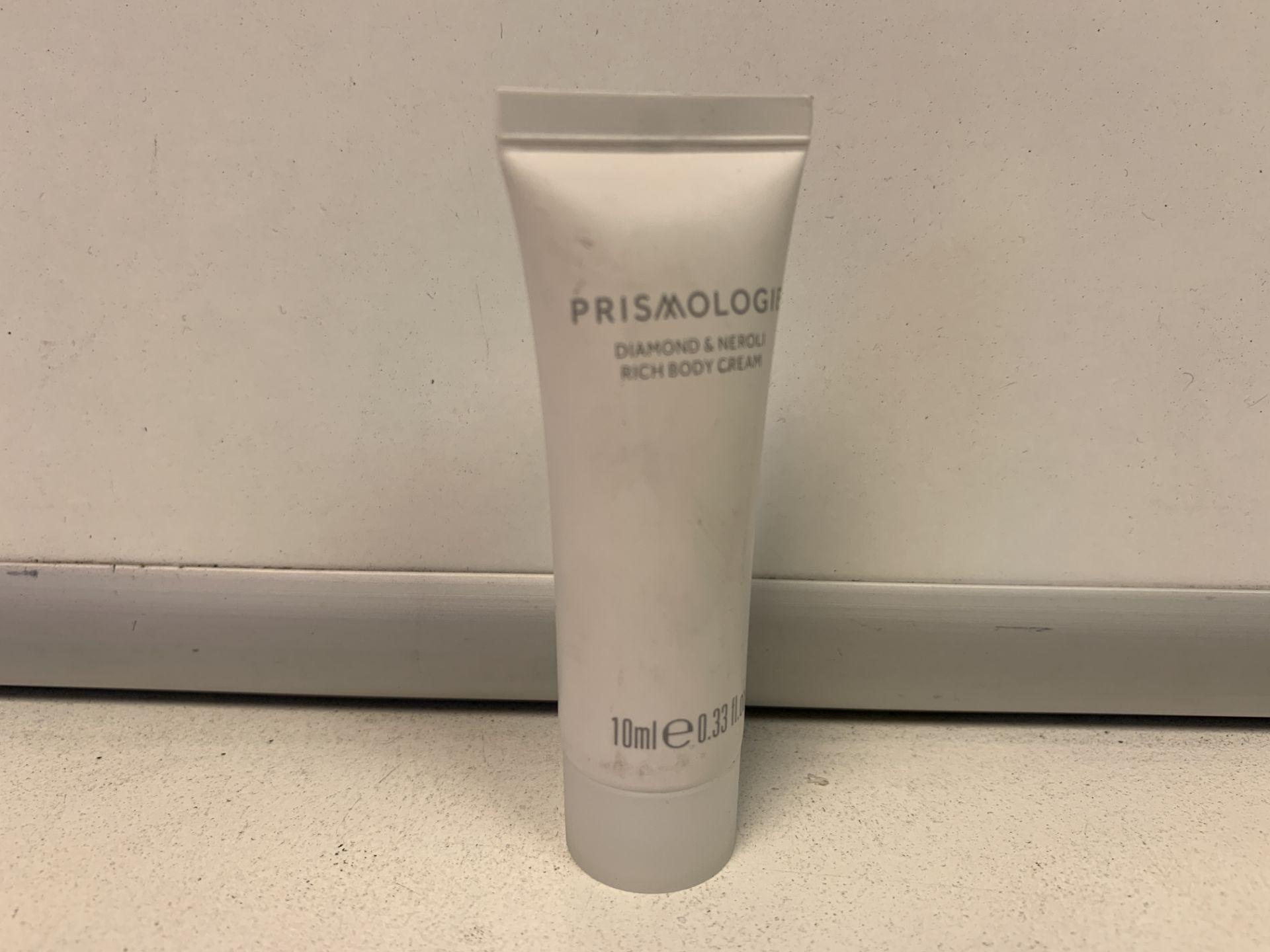 150 X BRAND NEW PRISMOLOGIE 10ML DIAMOND AND NERIOLI PURIFYING BODY CREAM RRP £2.50 EACH