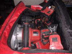 4 PIECE MILWAUKEE KIT COMES WITH 2 BATTERIES, CHARGER AND CARRY CASE (UNCHECKED / UNTESTED )