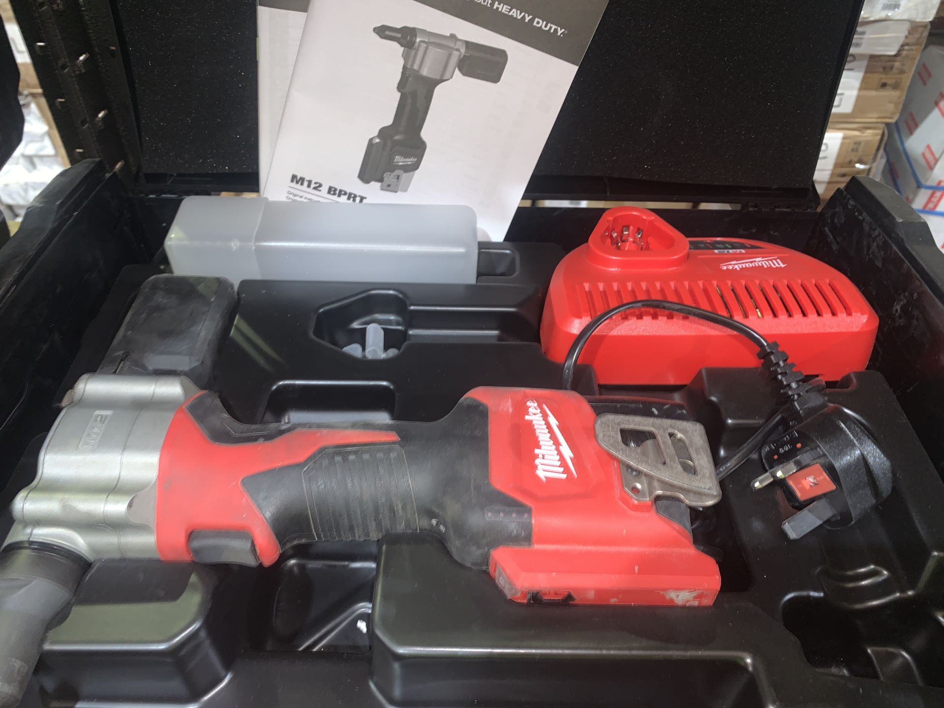 MILWAUKEE M12 BPRT POP RIVETER COMES WITH BATTERY, CHARGER AND CARRY CASE (UNCHECKED)