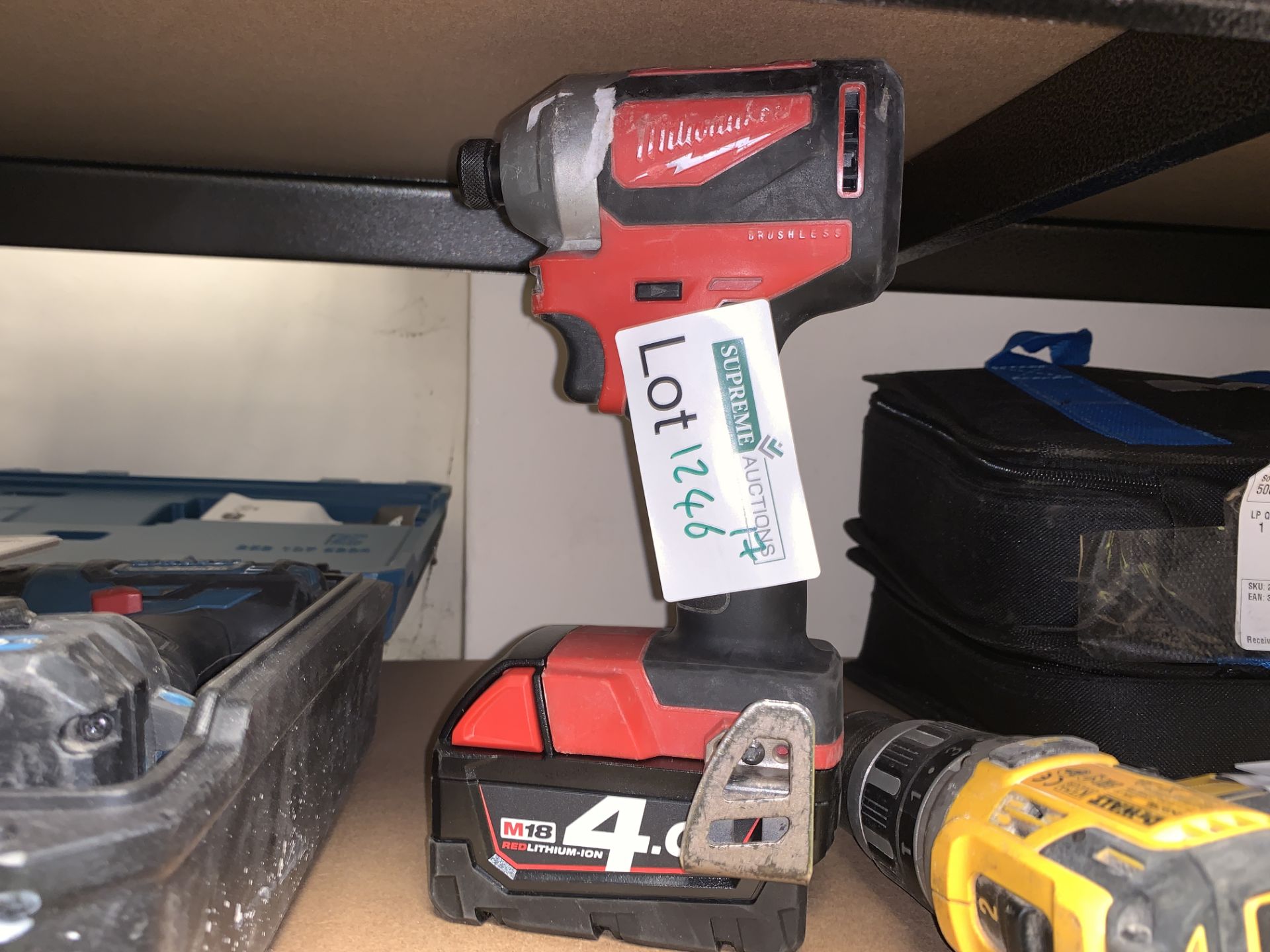 MILWAUKEE CORDLESS IMPACT DRIVER COMES WITH BATTERY (UNCHECKED, UNTESTED)