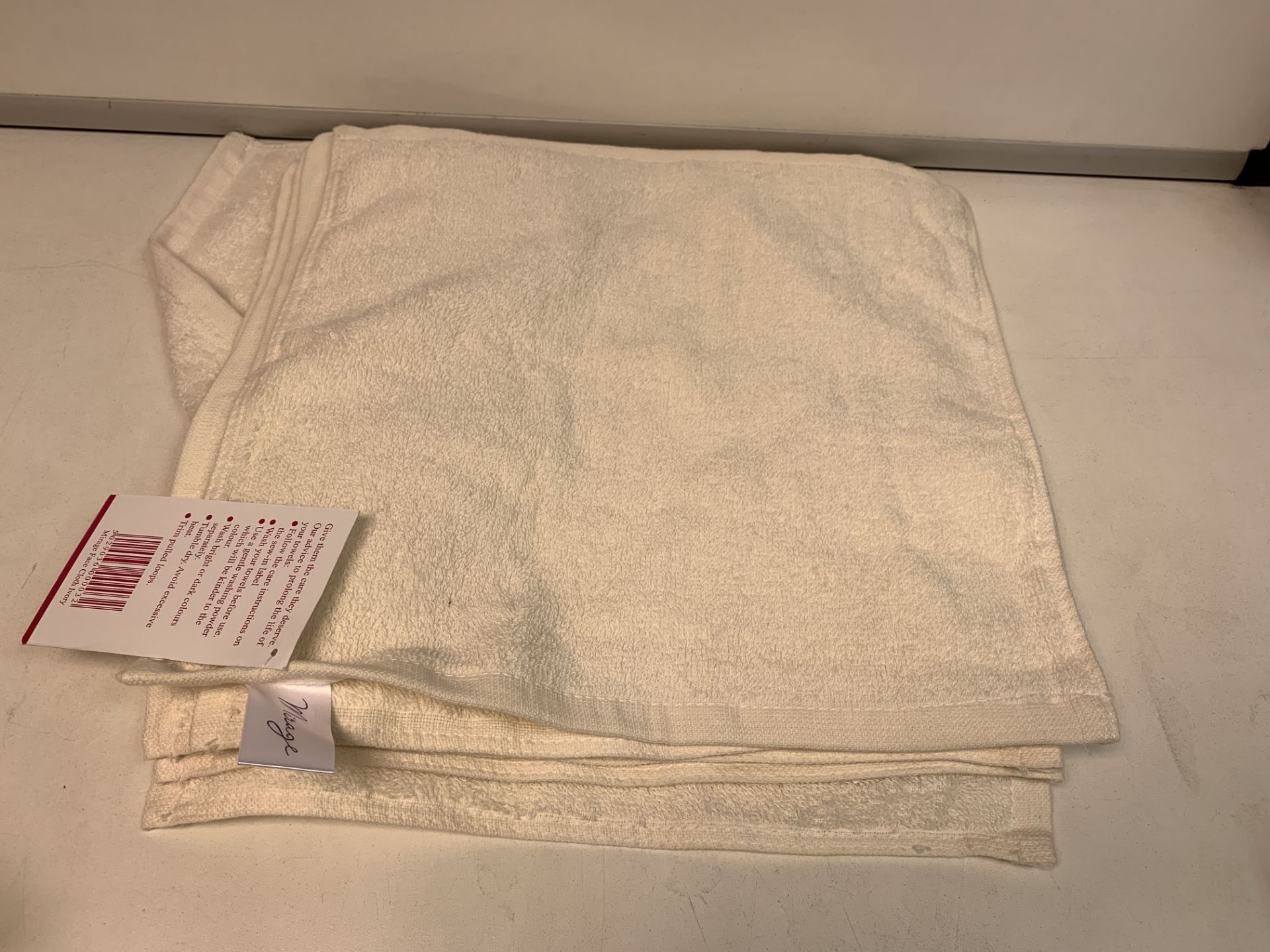 90 X BRAND NEW IVORY FACE TOWELS