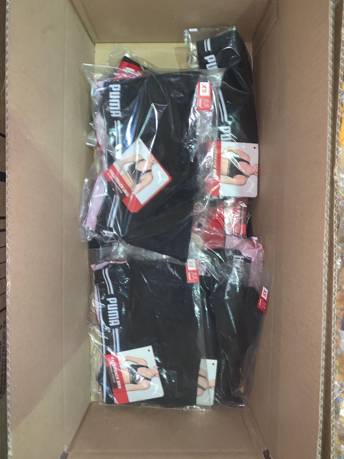 10 X BRAND NEW INDIVIDUALLY PACKAGED PUMA RACERBACK BLACK BRAS IN VARIOUS SIZES