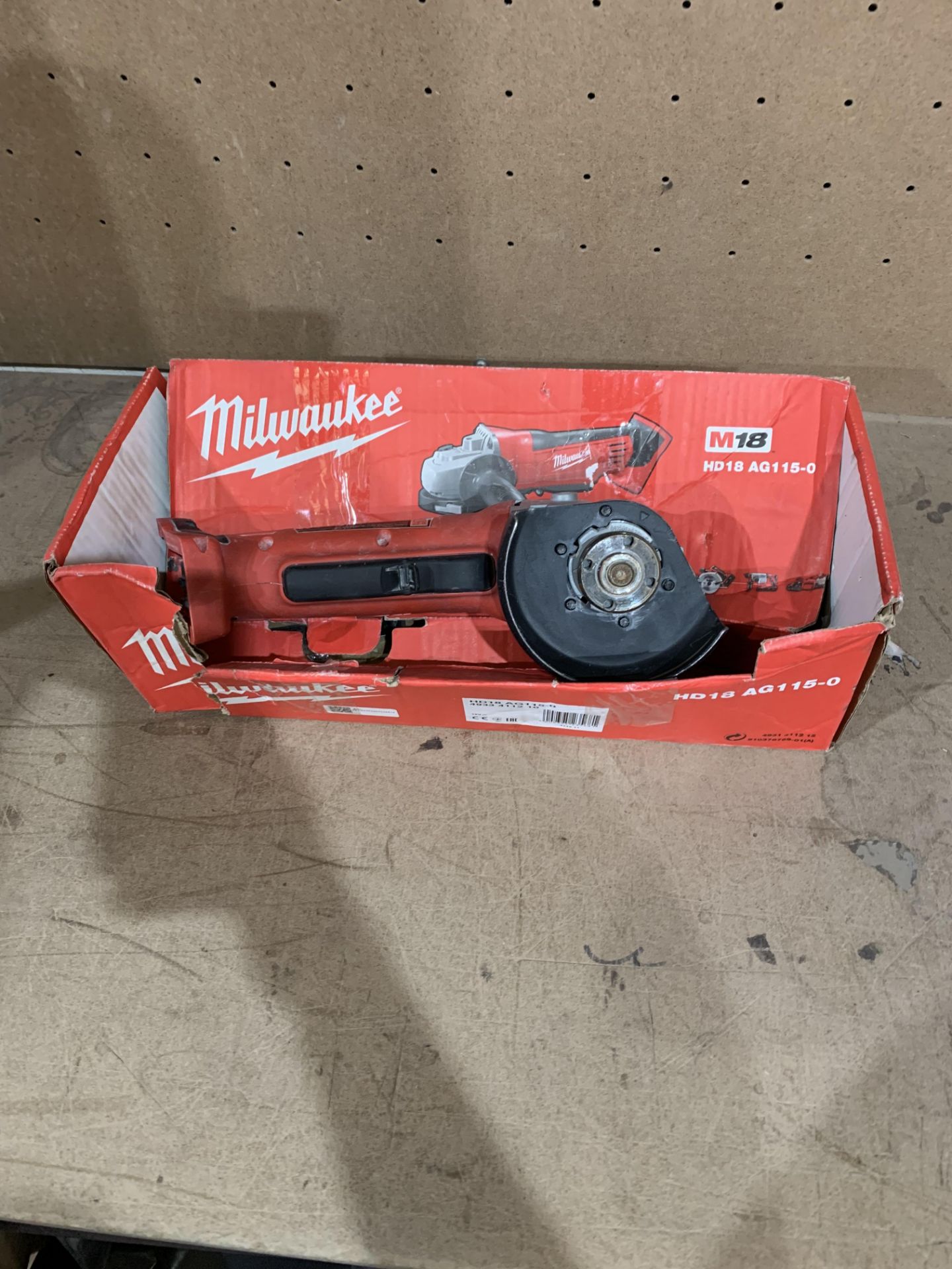 MILWAUKEE CORDLESS ANGLE GRINDER COMES WITH BOX (UNCHECKED, UNTESTED)