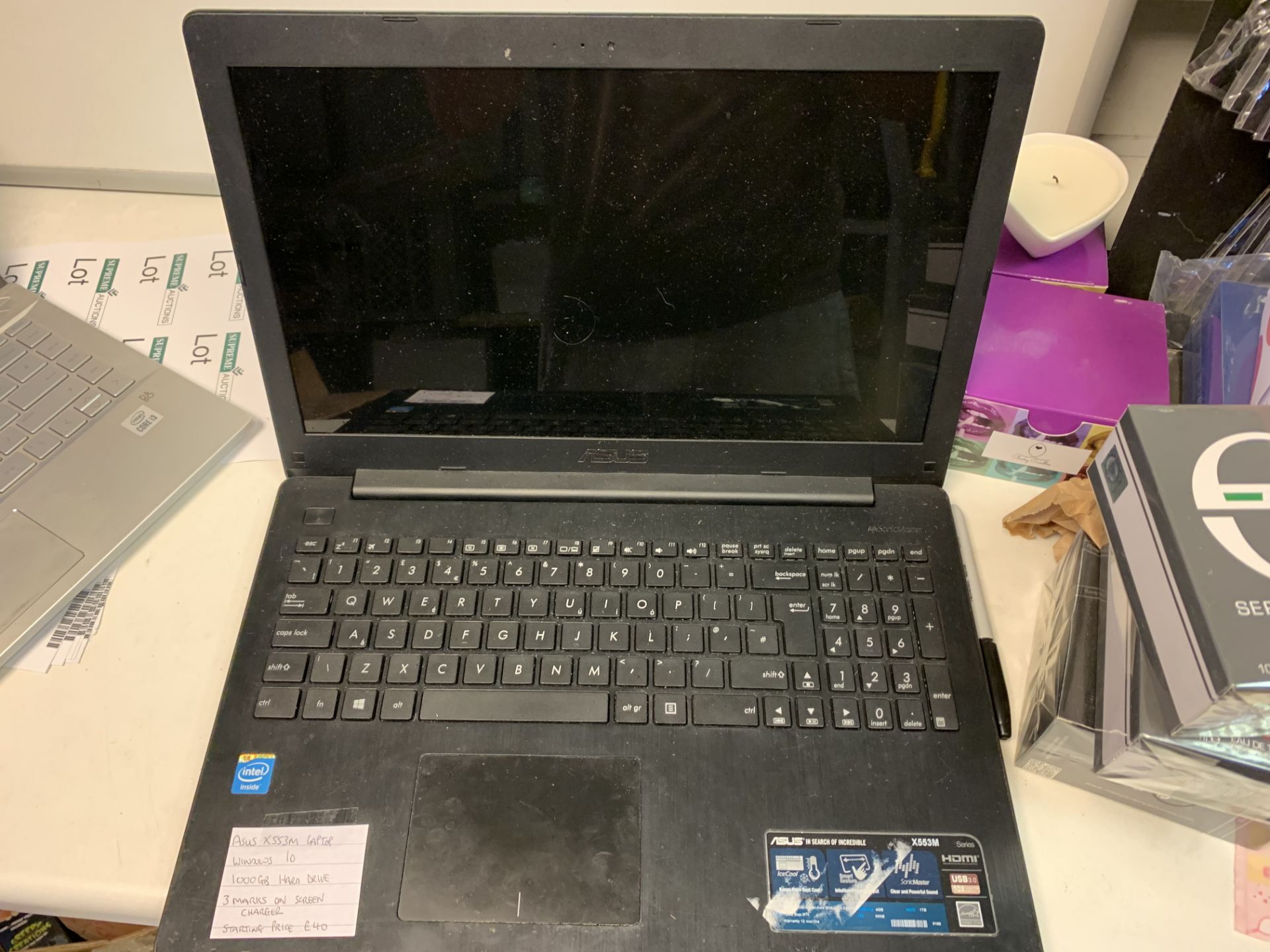 ASUS X553M LAPTOP, WINDOWS 10, 1000GB HARD DRIVE, 3 MARKS ON SCREEN WITH CHARGER