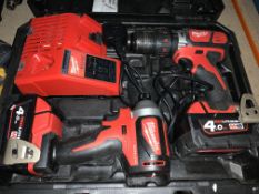 MIULWAUKE TWIN PACK CORDLESS COMBI DRILL AND IMPACT DRIVER COMES WITH 2 BATTERIES, CHARGER AND CARRY