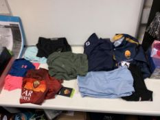 BRAND NEW CLOTHING LOT, INCLUDING NIKE, UNDER ARMOUR, ROMA FC, USA PRO, LA GEAR, VX3 ETC RRP £245