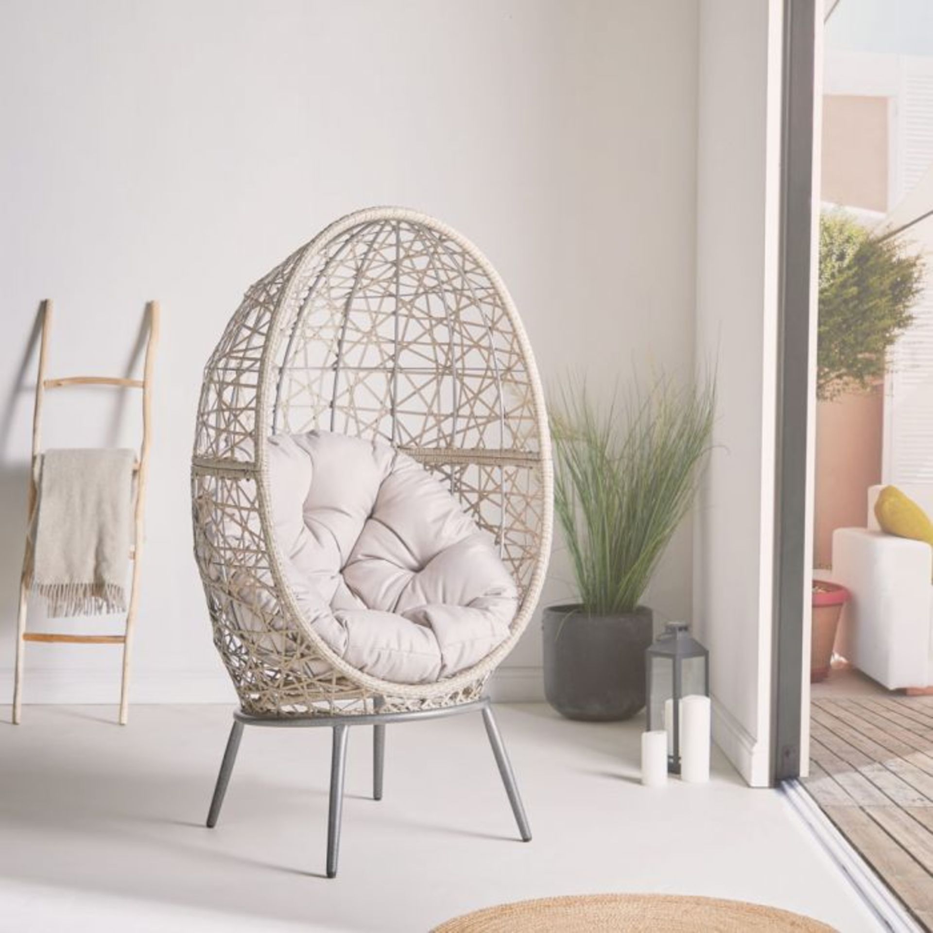 Freestanding Natural Rattan Egg Chair. RRP £549.99. Get cosy on this rattan cocoon chair. (