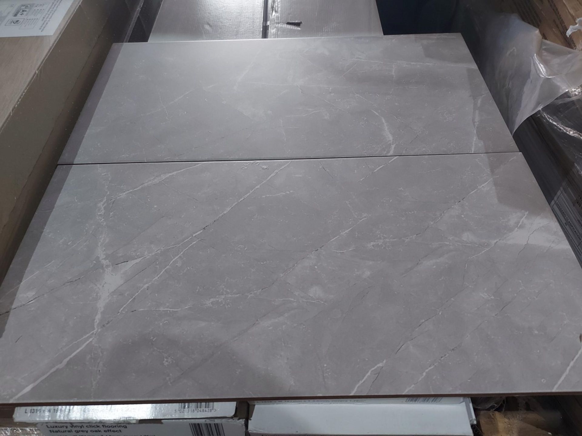 NEW PACKAGED 11.88m2 OF KILLINGTON GREY GLAZED CERAMIC WALL AND FLOOR TILES. 300x600MM. 9MM THICK