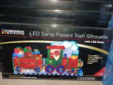 NEW BOXED 7 X LED SANTA PRESENT TRAIN SILHOUETTE WITH LEDS BULBS APPROX 24x45cm EYE CATCHER (