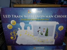 NEW BOXED 2 X LED TRAIN WITH SNOWMAN CHOIR PLAYING EIGHT FESTIVE TUNES, 4 BRIGHT WHITE LEDS (