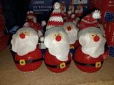 BOX OF NEW 5.5" COLOUR CHANGING SANTAS APPROX 12 IN A BOX 3 X LR41 BATTERIES NEEDED (NOT INCLUDED) -